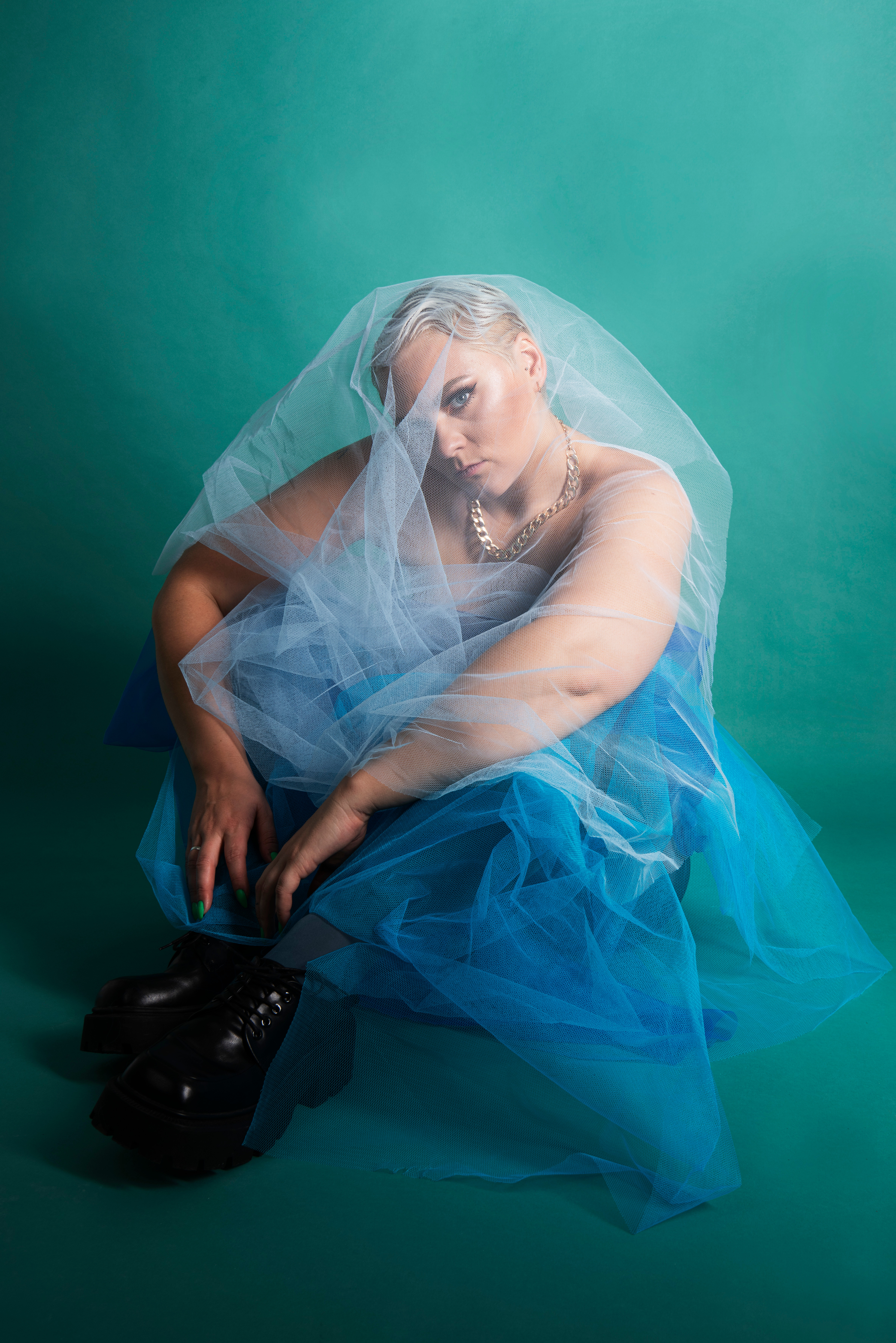 fannyBeckman portrait blue dress seated on floor