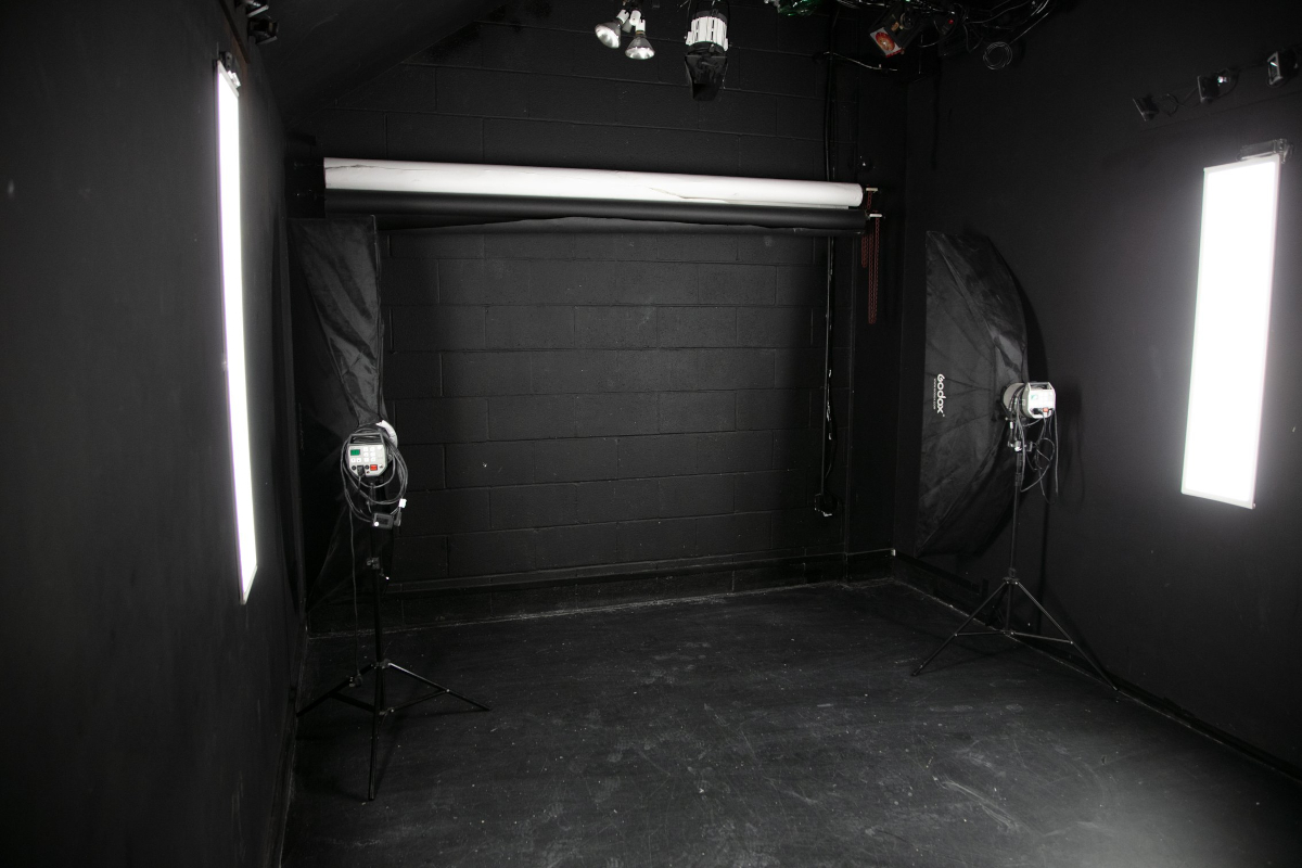 black studio overhead lights with gels