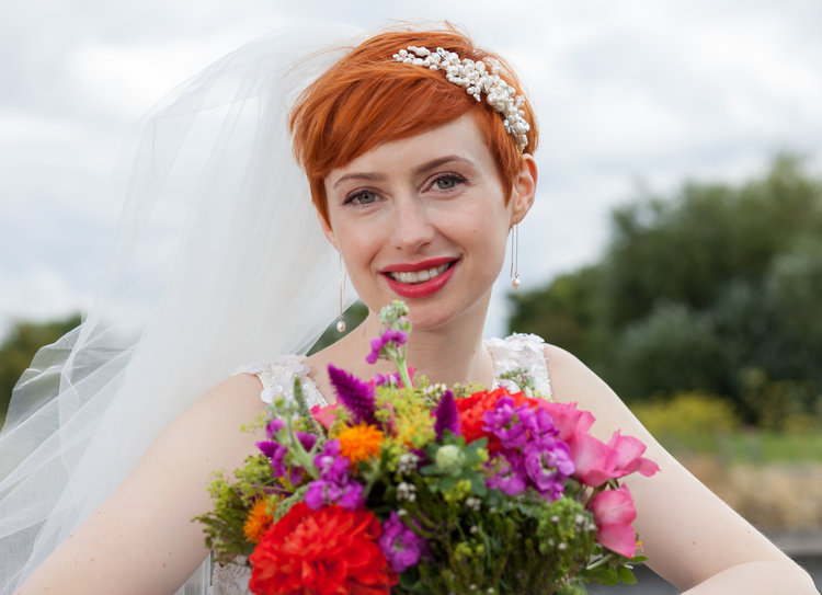 wedding renatoc bride with flowers